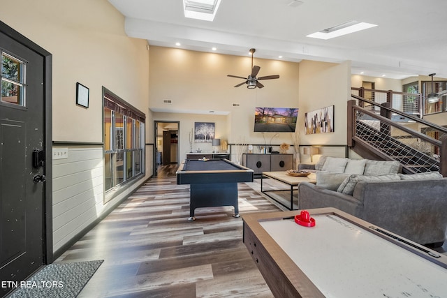 recreation room featuring billiards, recessed lighting, wood finished floors, and a wealth of natural light