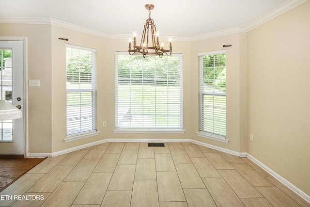 unfurnished dining area with a wealth of natural light, visible vents, baseboards, a chandelier, and ornamental molding