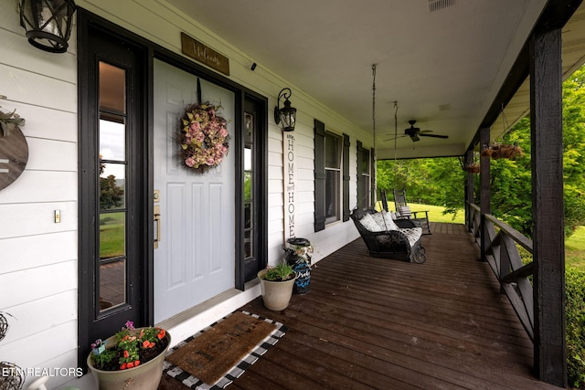 291 County Road 275, Niota, TN 37826 - wooden terrace with covered porch and a ceiling fan