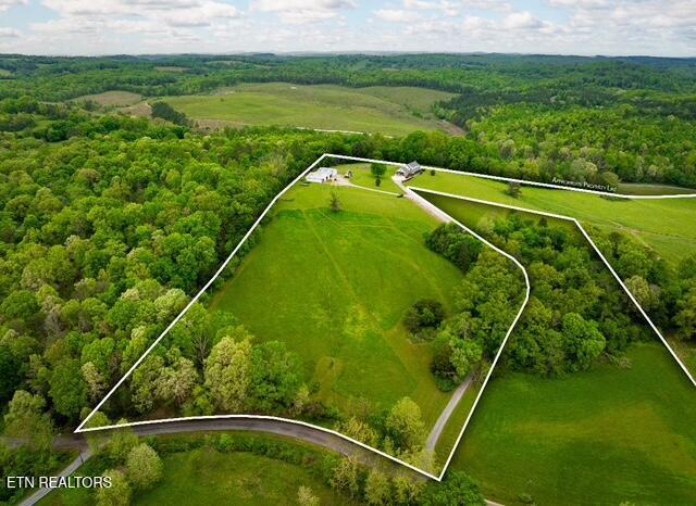 291 County Road 275, Niota, TN 37826 - aerial view of sparsely populated area with property parcel outlined and a forest