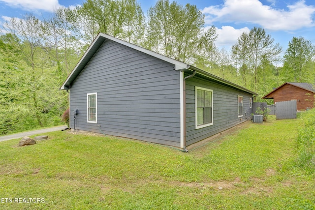1045 Indian Gap Rd, Sevierville, TN 37876 - view of property exterior with cooling unit and a yard