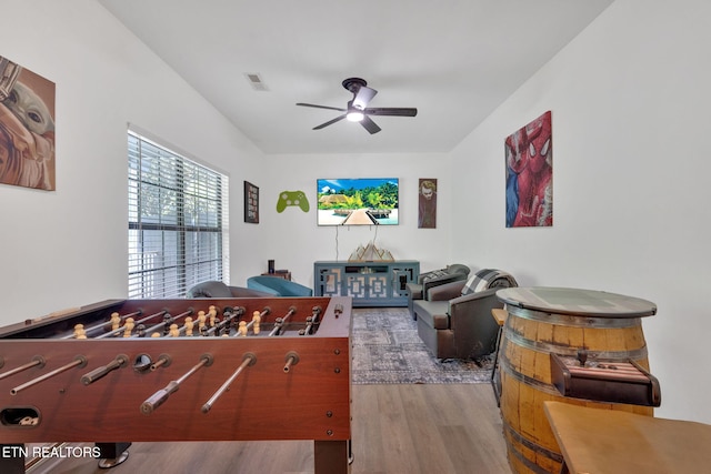 1045 Indian Gap Rd, Sevierville, TN 37876 - playroom featuring ceiling fan, visible vents, and wood finished floors