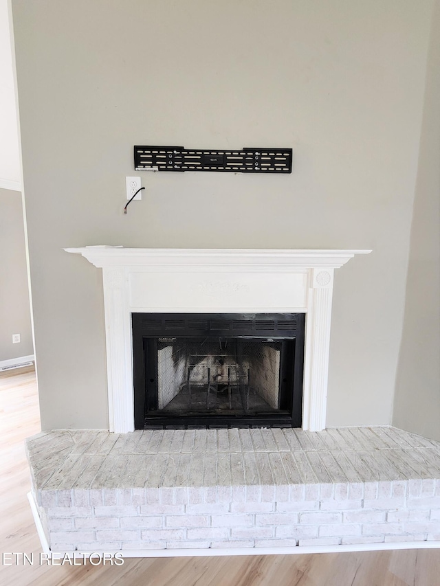 701 Misty Ridge Dr, Lenoir City, TN 37772 - detailed view of a fireplace and wood finished floors