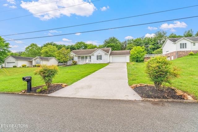 701 Misty Ridge Dr, Lenoir City, TN 37772 - ranch-style house featuring a garage and concrete driveway