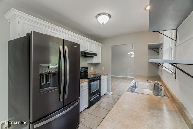 701 Misty Ridge Dr, Lenoir City, TN 37772 - kitchen featuring refrigerator with ice dispenser, black electric range, a sink, under cabinet range hood, and white cabinets