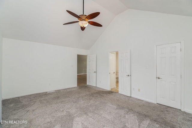 701 Misty Ridge Dr, Lenoir City, TN 37772 - unfurnished bedroom with high vaulted ceiling, carpet flooring, baseboards, connected bathroom, and ceiling fan
