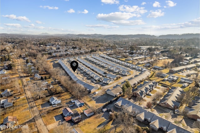bird's eye view featuring a mountain view and a residential view