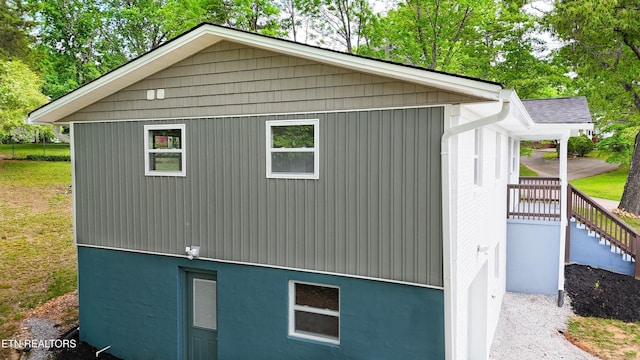 view of home's exterior with stairs