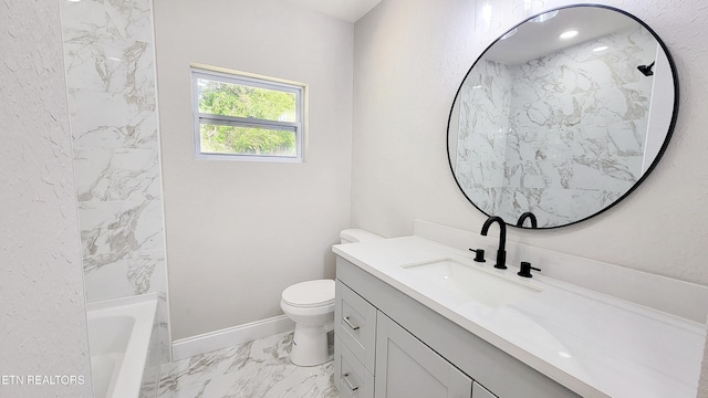 bathroom with vanity, baseboards, toilet, and marble finish floor