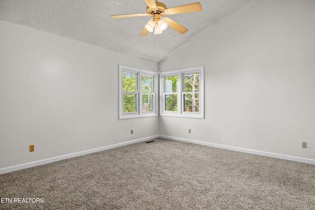spare room with visible vents, a ceiling fan, baseboards, a textured ceiling, and carpet flooring