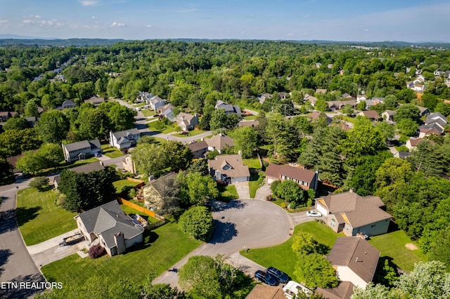 bird's eye view with a residential view and a forest view