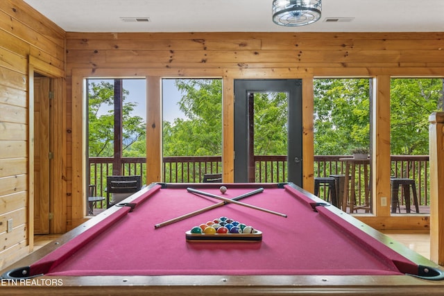 recreation room featuring wood walls, billiards, visible vents, and plenty of natural light