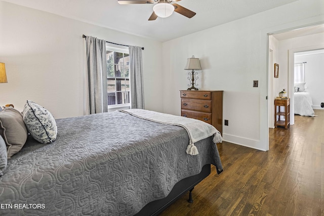 bedroom with baseboards, dark wood-type flooring, and a ceiling fan