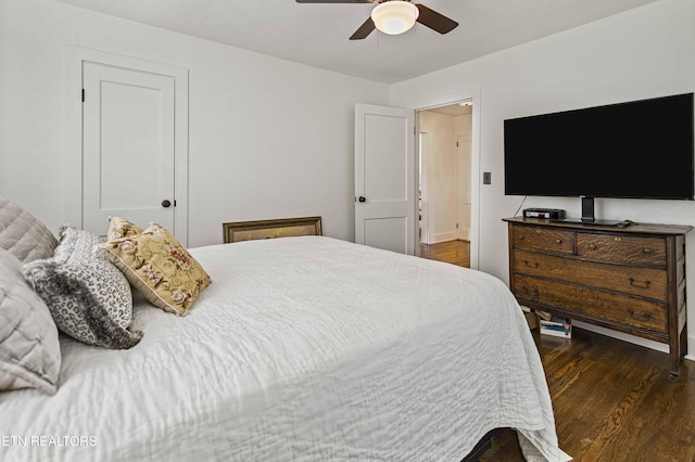 bedroom featuring wood finished floors and a ceiling fan