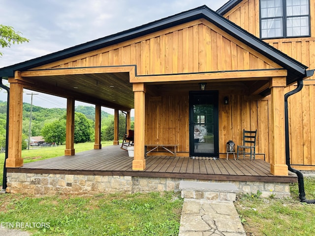 property entrance with board and batten siding