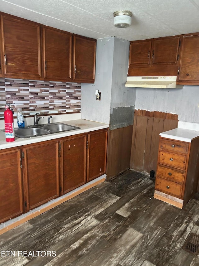 464 Brushy Valley Rd, Clinton, TN 37716 - kitchen featuring under cabinet range hood, light countertops, a sink, and dark wood-style floors