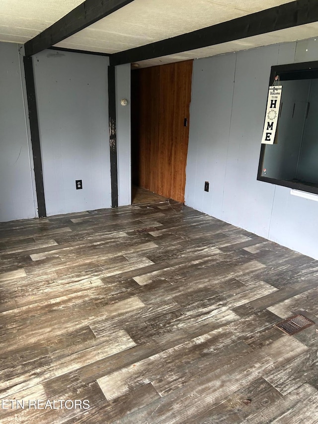 464 Brushy Valley Rd, Clinton, TN 37716 - empty room with wood walls and wood finished floors