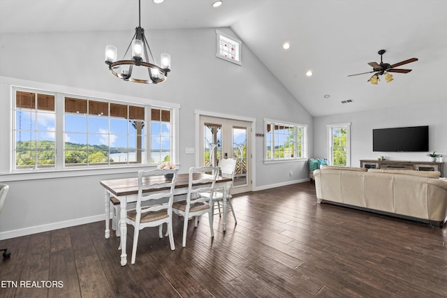 2738 Indian Creek Rd, Dandridge, TN 37725 - dining area featuring dark wood-style flooring, baseboards, high vaulted ceiling, recessed lighting, and ceiling fan with notable chandelier