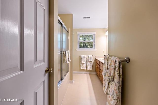 2227 Bay Pointe Dr, Hixson, TN 37343 - bathroom featuring baseboards, visible vents, and vanity