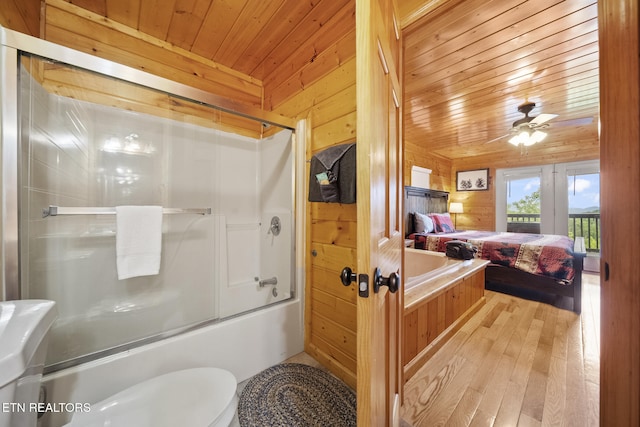 1644 Pinewood Way, Sevierville, TN 37862 - ensuite bathroom with connected bathroom, wood walls, hardwood / wood-style floors, combined bath / shower with glass door, and wood ceiling
