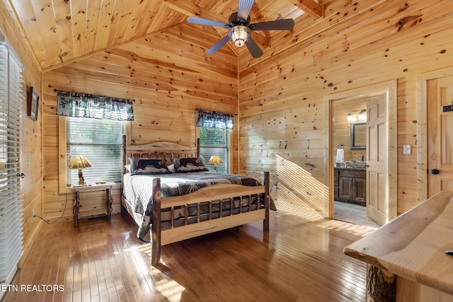 2471 Cove Mountain Ln, Sevierville, TN 37862 - bedroom with wood-type flooring, ensuite bath, wooden walls, and wooden ceiling