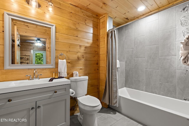 2471 Cove Mountain Ln, Sevierville, TN 37862 - full bathroom featuring wood walls, tile patterned flooring, and toilet