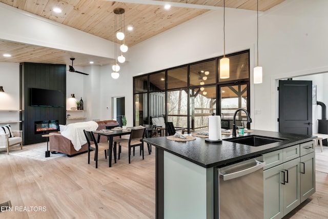 - Chinquapin Drive, Sevierville, TN 37876 - kitchen featuring wood ceiling, dark countertops, a sink, light wood finished floors, and open floor plan