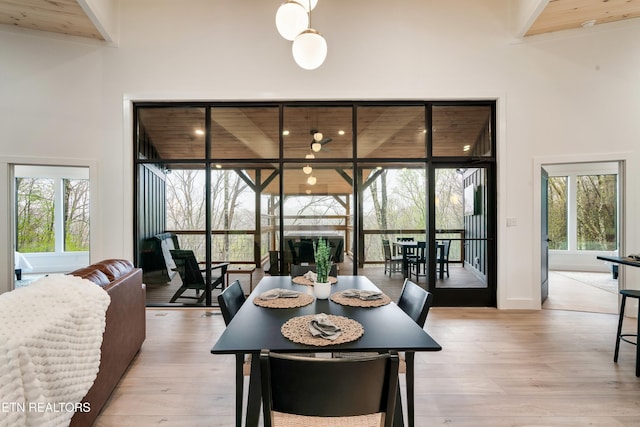 - Chinquapin Drive, Sevierville, TN 37876 - dining space with a high ceiling and light wood-style flooring