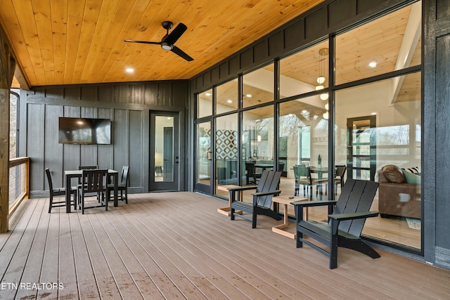 - Chinquapin Drive, Sevierville, TN 37876 - wooden deck with outdoor dining area and ceiling fan