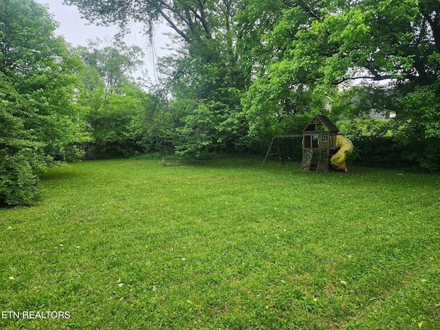 view of yard featuring a playground