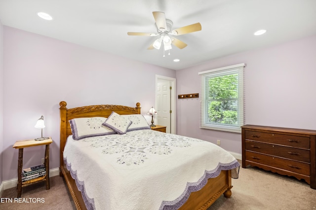 bedroom featuring light carpet, baseboards, a ceiling fan, and recessed lighting