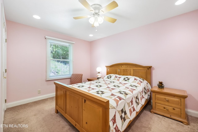 bedroom with light carpet, baseboards, a ceiling fan, and recessed lighting