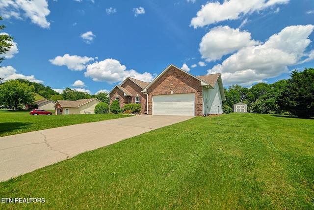 view of front of home with brick siding, a front lawn, an attached garage, and concrete driveway