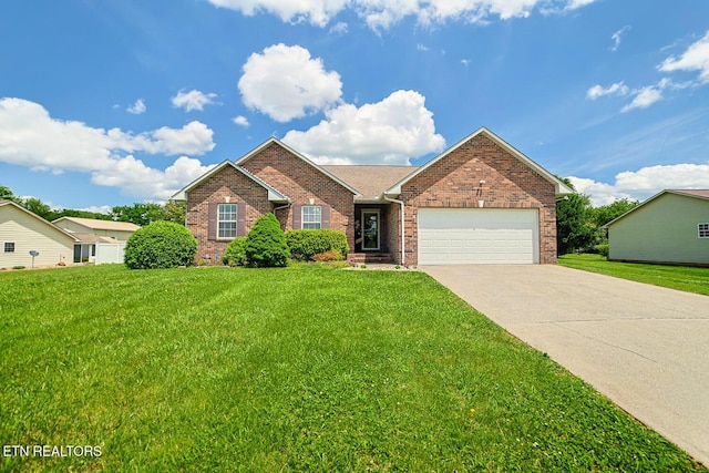 single story home with a garage, brick siding, driveway, and a front yard
