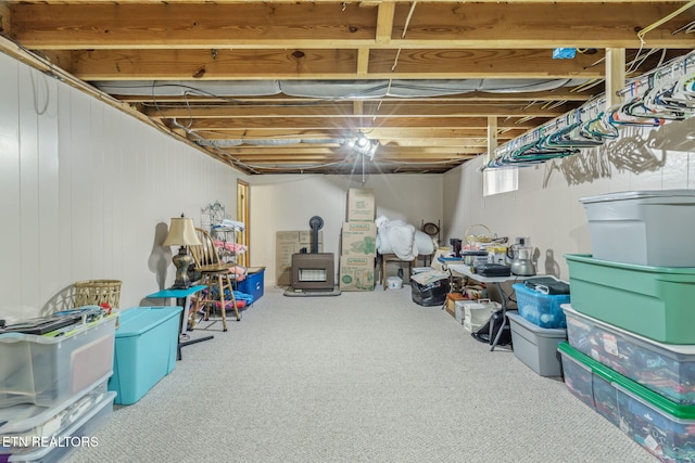 basement featuring carpet flooring