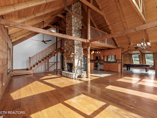 155 George Thomas Rd, Vonore, TN 37885 - unfurnished living room with pool table, a stone fireplace, light wood finished floors, wood ceiling, and high vaulted ceiling