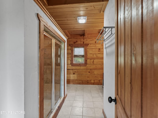 155 George Thomas Rd, Vonore, TN 37885 - hallway with light tile patterned floors, wood walls, and wooden ceiling