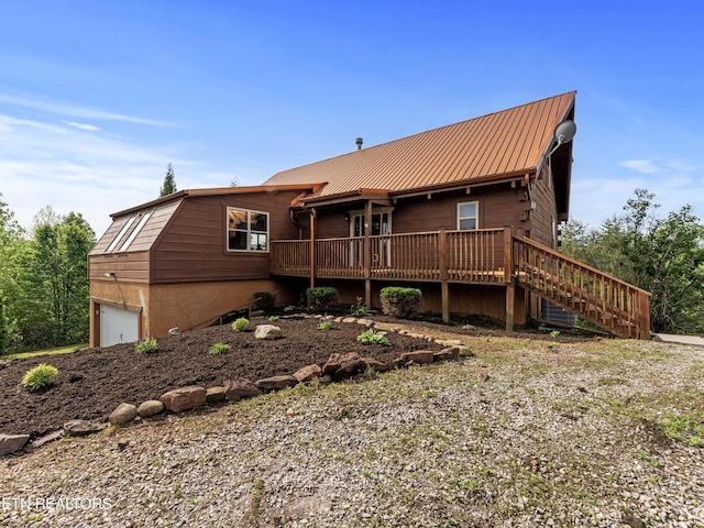 155 George Thomas Rd, Vonore, TN 37885 - back of house featuring metal roof, a wooden deck, an attached garage, and stairs