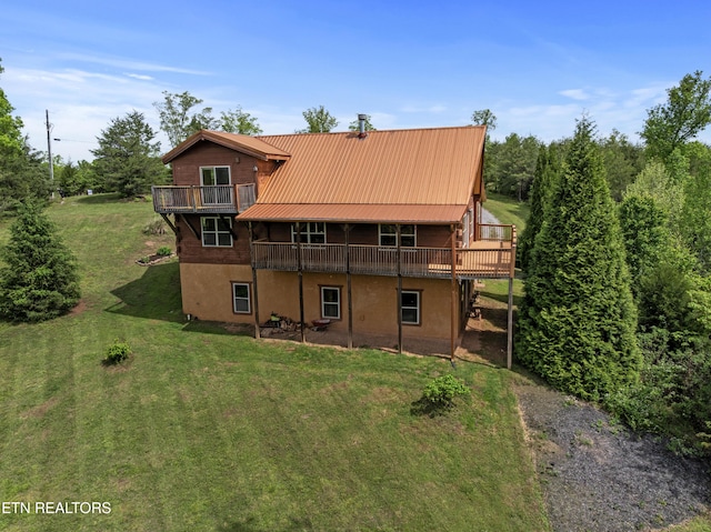 155 George Thomas Rd, Vonore, TN 37885 - rear view of property with a yard, metal roof, and a wooden deck