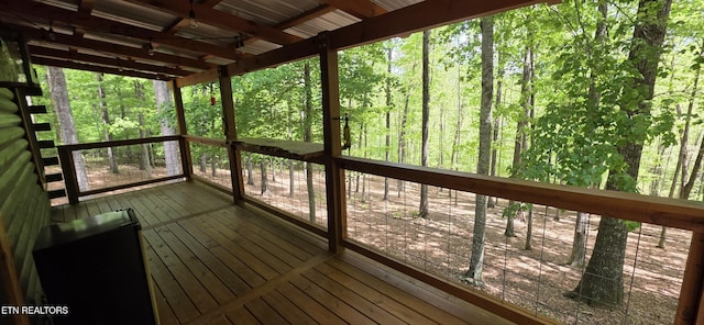 2165 Street Place Loop, Monterey, TN 38574 - unfurnished sunroom featuring a view of trees