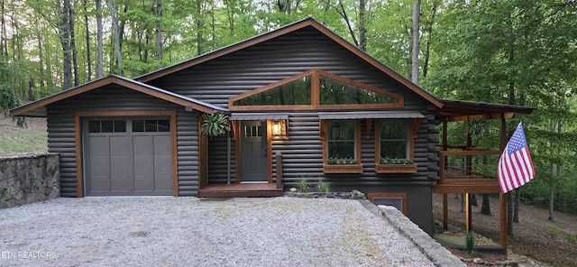 2165 Street Place Loop, Monterey, TN 38574 - view of front facade with a garage and log exterior