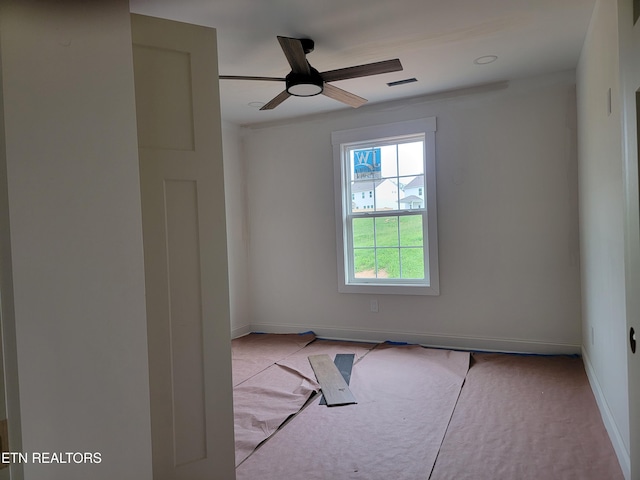 244 Sugar Maple Trl, Lenoir City, TN 37771 - spare room featuring baseboards, carpet flooring, and ceiling fan