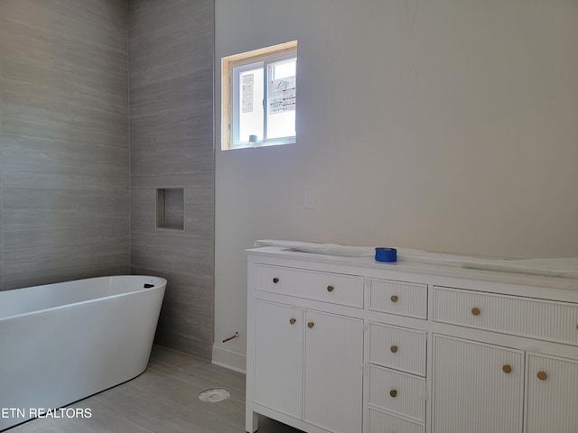 244 Sugar Maple Trl, Lenoir City, TN 37771 - full bath with a soaking tub and wood finished floors
