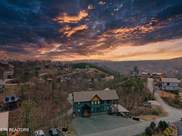 aerial view at dusk with a mountain view