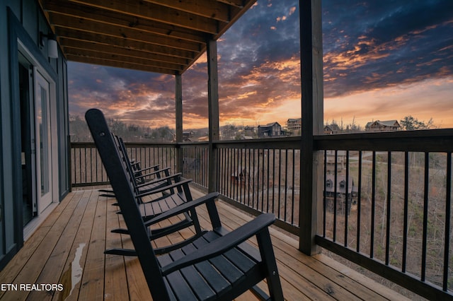 deck at dusk with stairway