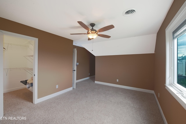 1012 Falcon Crest Dr, Seymour, TN 37865 - additional living space with carpet floors, visible vents, baseboards, ceiling fan, and lofted ceiling