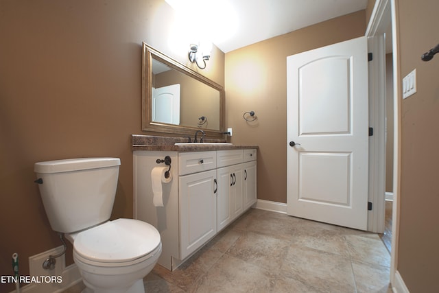 1012 Falcon Crest Dr, Seymour, TN 37865 - half bathroom with toilet, baseboards, vanity, and stone finish flooring