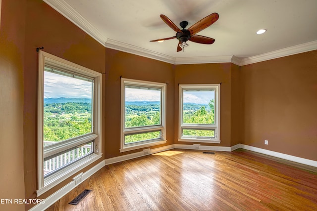 1012 Falcon Crest Dr, Seymour, TN 37865 - empty room featuring light wood finished floors, visible vents, and baseboards