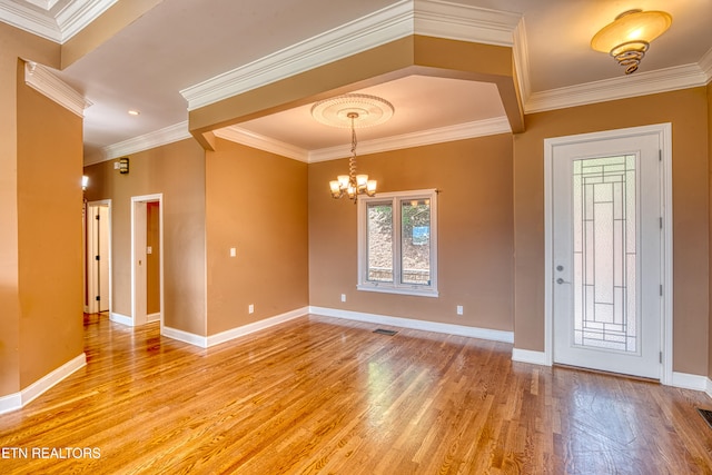 1012 Falcon Crest Dr, Seymour, TN 37865 - entrance foyer with light wood-type flooring, a chandelier, visible vents, and ornamental molding