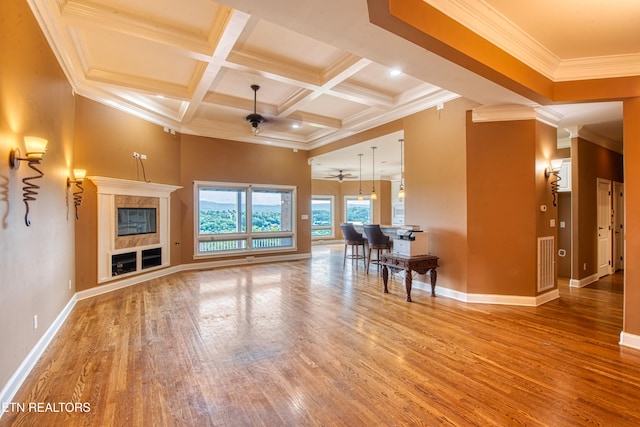 1012 Falcon Crest Dr, Seymour, TN 37865 - living room featuring coffered ceiling, ceiling fan, crown molding, wood finished floors, and beam ceiling